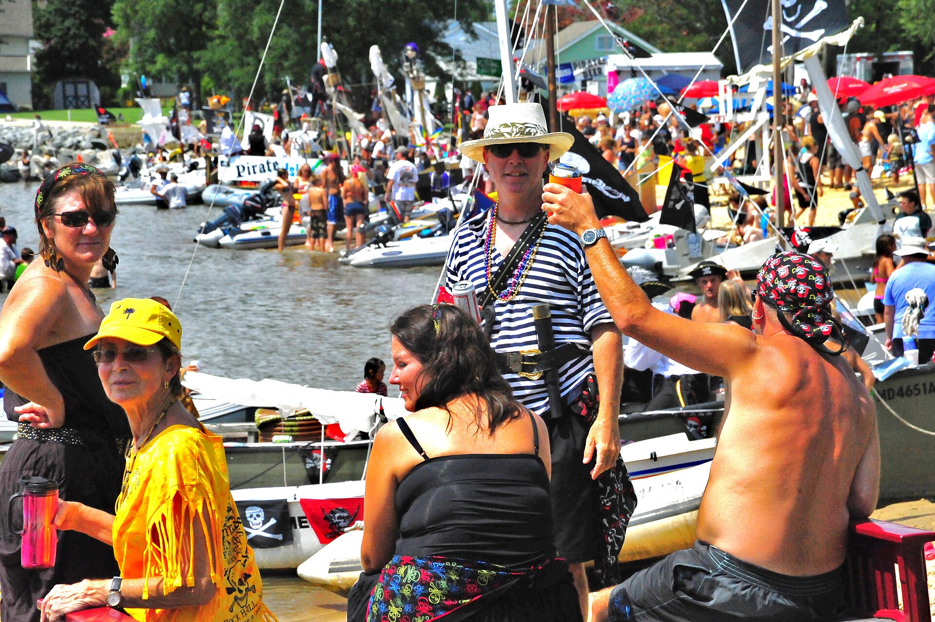People gathering at a beach party