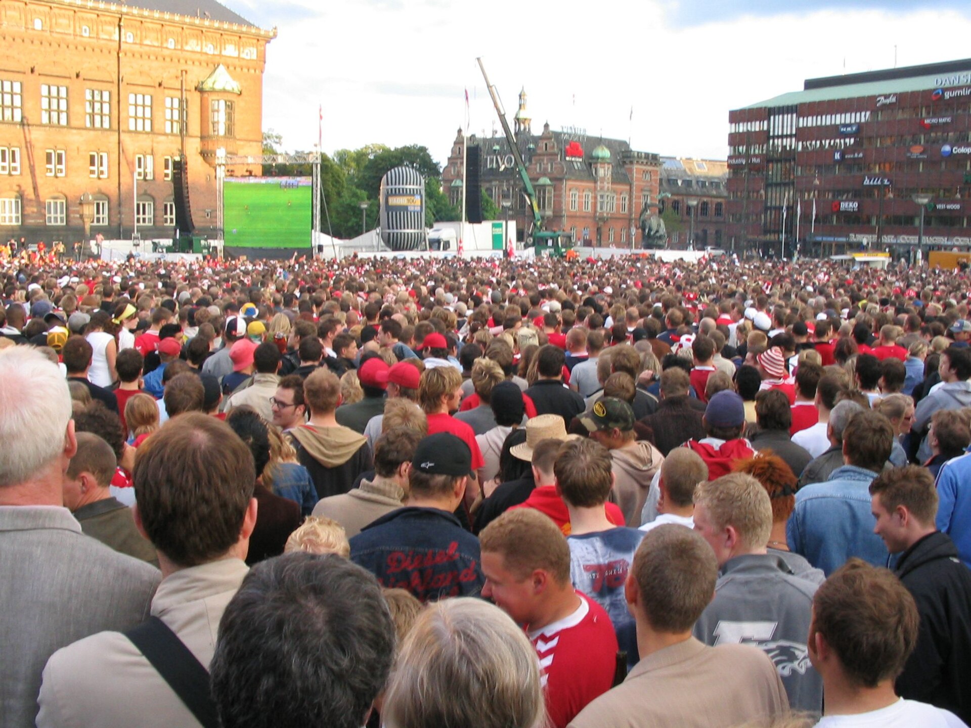 Calm soccer crowd in a stadium stand before play