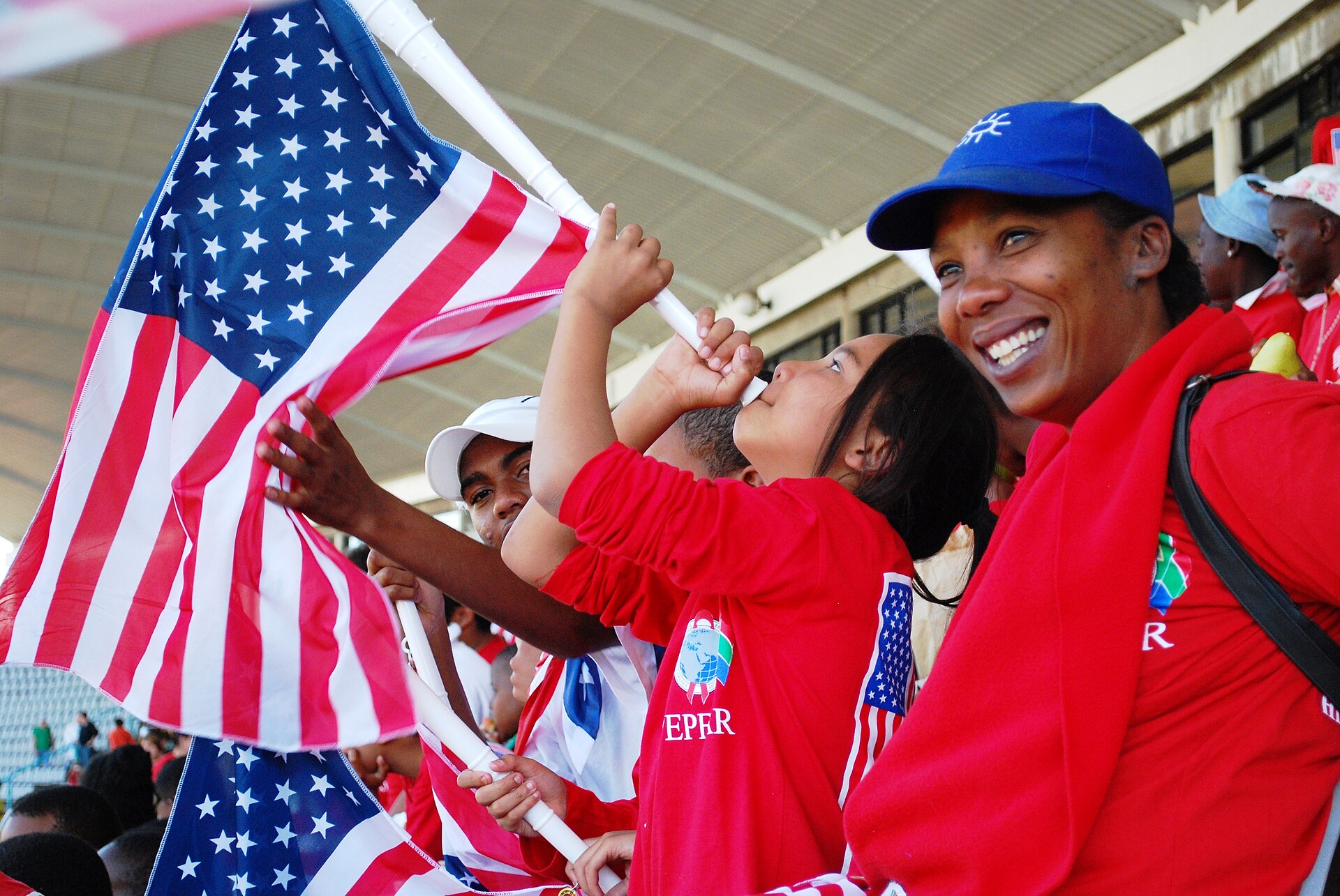 Soccer fans cheering during a national team match